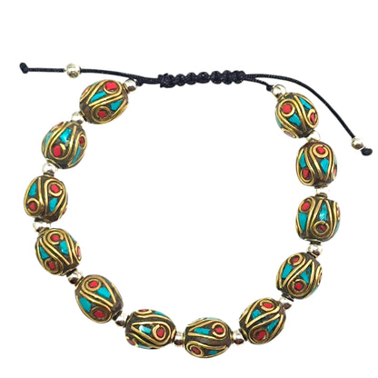 Pulsera Tibetana entrepieza 8mm (EL DIJE PUEDE LIGERAMENTE SER DIFERENTE) Ref:600404345-07