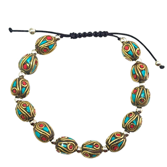 Pulsera Tibetana entrepieza 8mm (EL DIJE PUEDE LIGERAMENTE SER DIFERENTE) Ref:600404345-07
