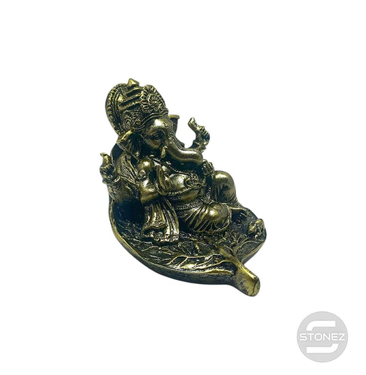 600102865 Figura Ganesha Sentada En Hoja De Resina 10 Cms Aprox