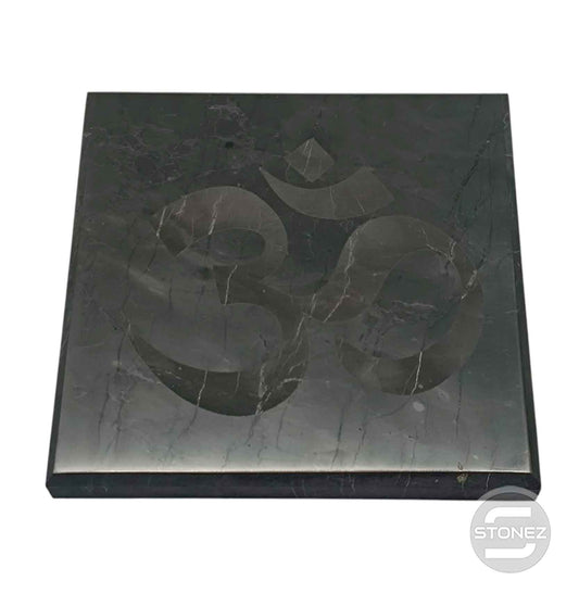 600803857-03 Base Shungita 10x10 Cms Aprox Pulido Grabado Om