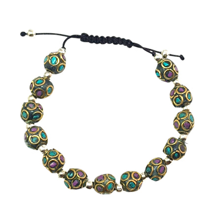 Pulsera Tibetana entrepieza 8mm (EL DIJE PUEDE LIGERAMENTE SER DIFERENTE) Ref:600404345-09