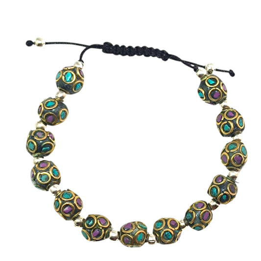 Pulsera Tibetana entrepieza 8mm (EL DIJE PUEDE LIGERAMENTE SER DIFERENTE) Ref:600404345-09